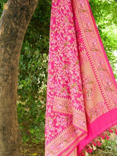 Elevate your style with our Pure Georgette Silk Meenakari Banarasi Dupatta. This luxurious Banarasi dupatta showcases an intricate Meenakari peacock, adding timeless charm and regality to your ensemble. Celebrate Banaras' artistry and heritage. Can be dyed in any color of your choice. Anarkali Shawl With Zari Work For Traditional Ceremonies, Pink Meenakari Chandbali Dupatta, Festive Diwali Pashmina Shawl With Zari Work, Banarasi Silk Traditional Shawl With Pallu, Banarasi Silk Shawl With Pallu, Zari Work Pashmina Shawl For Traditional Ceremonies, Festival Jamawar Pashmina Shawl With Pallu, Bollywood Style Jamawar Pashmina Shawl With Traditional Patterns, Jamawar Pashmina Shawl With Motifs For Traditional Ceremonies