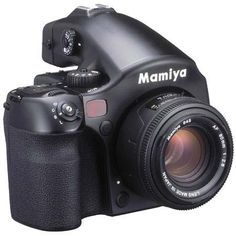 a black camera with a lens attached to it's body and the words mamiya written on the front