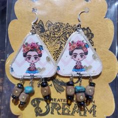 Triangle Form With Kahlo Image And Beads On Bottom Edge Artisan Beaded Metal Earrings For Gift, Artisan Beaded Earrings For Gift, Artisan Nickel Free Beaded Earrings Gift, Triangle Form, Plastic Crafts, Fun Earrings, Earrings Color, Cross Stitch, Handmade Jewelry