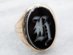 Sized to be worn comfortably for a gentleman, this would make a fantastic statement piece for a lady, as well. The centerpiece of rich, black onyx is immaculately carved with a gothic Old English initial H.Please note that this piece has its original monogram, and unfortunately, this piece cannot be altered without affecting the quality of the piece. Please feel free to contact us to help you find the perfect piece for your style and budget! Metal: 14K Yellow GoldGem: Black OnyxTop Measurements: H Initial, Signet Ring Gold, H Monogram, Onyx Signet Ring, Signet Ring Men, Gold Signet Ring, Signet Rings, Ring Antique, Antique Roses