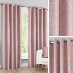 pink curtains hanging on the side of a window