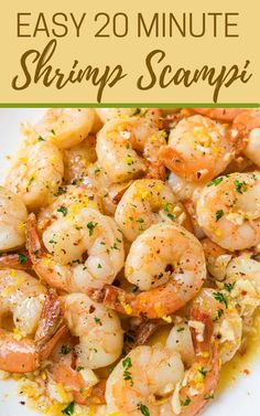 shrimp scamps with lemon and parsley in a white bowl on top of a table