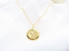 ✦ REALLY HANDMADE HIGH QUALITY // FULLY DESIGNED AND MADE IN PARIS 20 mm // 18k Solid gold hammered disk * Satellite chain with dainty disk pendant Necklace * Coin necklace, Solid gold Necklace for Women * Gold medallion 👉 GP is : 18K gold plated over silver 925 (vermeil) 5 Micron is the highest degree of plated (rose or yellow) 👉Solid 18K: high quality recycled solid gold metal 18K 👉Sterling silver 925 recycled * Type : Necklace with dainty pendant,disc * Material (chain & pendant) : Strong Quality Gold over silver (vermeil) * Length : 38/42/45/50 with 5cm adjustable 5 cm chain on top  * Thickness of the chain : 1mm and Spring ring closure * Necklace on picture is 45 cm * Handmade in Paris  * All designs and personalization is done ✦ BY HAND ✦  in Paris :-) * Ethically Sourced material Gold Disc Necklace, Gold Medallion, Solid Gold Necklace, Dainty Pendant, Gold Disc, Disc Pendant, Gold Necklace Women, Disc Necklace, Coin Necklace