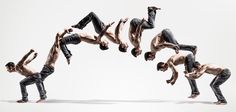 six men are doing tricks in the air with their hands and legs spread out to form an upside down man