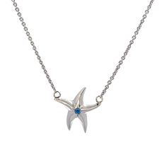 Introducing our stunning Starfish Mini Necklace, a beautiful piece of jewelry perfect for ocean lovers. The starfish pendant measures 13 MM and hangs on a delicate 1 MM solid rolo chain with a total length of 18'' that can be adjusted to suit your preference. Crafted from high-quality Sterling Silver with Rhodium, this necklace is sure to catch the eye and last a lifetime. The blue stone accent in the center of the starfish represents the beauty of tropical waters, adding an extra touch of elegance and charm. Our Starfish Mini Necklace is a versatile piece of jewelry that can be worn for any occasion. Whether you want to add some ocean-inspired flair to your daily outfit or complement your beach attire, this necklace will surely do the trick. We also offer this necklace in 14k gold for tho Sterling Silver Starfish Charm Pendant Necklace, Sterling Silver Pendant Necklace With Starfish Charm, Sterling Silver Starfish Necklace With Star Charm, Sterling Silver Necklace With Starfish Charm, Blue Starfish Sterling Silver Necklace, Blue Sterling Silver Starfish Necklace, Mini Necklace, Beach Attire, Starfish Pendant