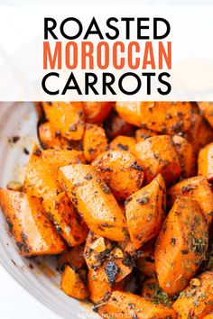 roasted moroccan carrots in a white bowl with text overlay that reads roasted moroccan carrots