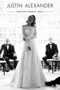 a woman in a wedding dress standing next to two men