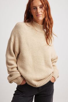 This sweater features a stretchy soft knit and oversize fit. It has a ribbed turtleneck and wide ribbed hems. Beige Pullover, Knit Turtleneck Sweater, Ribbed Turtleneck, Future Fashion, Beige Sweater, Na Kd, Knitted Sweater, Shirts & Tops, Soft Knits