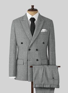 Establish a timeless monolith to your wardrobe by including our Highlander Light Gray Tweed Double Breasted Suit. Besides, it is made from a pure wool material, which reveals a thick, plush and slightly rough texture with an enriched warmth to pursue the business in the cold with ample heat. Further, it proves the sartorial proficiency by making an elegant, well-proportioned look while staying safe in their wardrobe choices no matter the season, offering that extra warmth once the winter closes Fitted Wool Double Breasted Suit For Winter, Winter Herringbone Suits For Tailoring, Timeless Double Breasted Suit With Suit Collar For Winter, Winter Herringbone Pattern Suits For Tailoring, Wool Double Breasted Suit For Business Casual, Winter, Tailored Gray Wool Tweed Jacket, Wool Double Breasted Winter Business Casual Suit, Winter Wool Double Breasted Suit For Business Casual, Classic Wool Double Breasted Suit For Winter