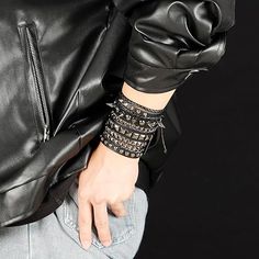 1. 3 Pcs Punk and Gothic Leather Bracelets you will get: A Cool Hollow Bracelet with Chain and Spikes + A Cool Hollow Bracelet with Chain and Rivet + An Attractive Punk Leather Bracelet with little Spikes 2. Punk and Gothic Style Bracelets: These bracelets are designed as punk and gothic jewelry accessories, therefore, you can not only match them with your daily casual dressing, but you can also dress them as punk and gothic outfits. 3. Adjustable Buckle: To continence our customers, these bracelets are designed with Adjustable buckle which mean you can save your time of confusing whether the bracelets' size fit your hands or not. 4. Material : Vintage Leather + Alloy 5. A good choice of present: These bracelets are made by man craft, it's suitable for sending to others as a gift. Silver Rivets Wristband For Concert, Punk Metal Wristband As Gift, Adjustable Punk Bracelet For Streetwear, Adjustable Punk Bracelets For Streetwear, Trendy Metal Wristband For Party, Silver Metal Leather Bracelet For Concerts, Rock Style Metal Jewelry For Streetwear, Silver Rocker Wristband For Concerts, Silver Metal Edgy Wristband