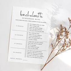 a printable bachelor scavenger hunt is shown next to some dried flowers on a white surface