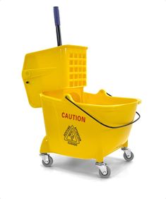 a yellow mop bucket on wheels with a cleaning brush in the bottom right hand corner