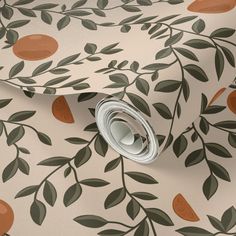 an orange and green wallpaper with leaves on it