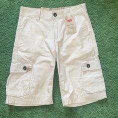 Levi’s Size 10 Light Tan Nwt! White Cargo Shorts For Spring, White Cargo Shorts With Side Pockets For Spring, Casual White Cargo Shorts For Summer, Spring White Cargo Shorts, Casual White Cargo Shorts, White Cargo Shorts With Pockets, White Cotton Cargo Shorts With Built-in Shorts, White Cotton Cargo Shorts For Summer, White Cotton Summer Cargo Shorts