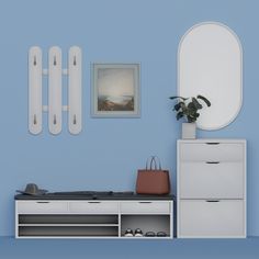 a room with blue walls and white furniture