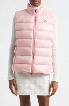 Signature channel-quilting brings Moncler flair to a stand-collar vest crafted of lacquered nylon and insulated with lofty down fill. Two-way front-zip closure Stand collar On-seam zip pockets Lined, with down fill 100% polyamide Dry clean Imported Women's Designer Clothing Collar Vest, Outerwear Vest, Puffer Vest, Outerwear Women, Designer Outfits Woman, Stand Collar, Mock Neck, Zip Pockets, Designer Clothing