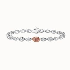 Flamingo pink is not just a color; it stands for potential, romance and balance. Oval and marquise diamond bracelet features a fancy intense orangy-pink oval diamond center piece set in rose gold. Created diamond 8.37ctw Fancy intense orangy-pink diamond, 1.05ct 14k white and rose gold Special order Oval Rose Gold Diamond Bracelets, Oval Diamond Bracelet In Rose Gold, Luxury Pink Diamond Bracelet, Marquise Diamond Bracelet, Flamingo Pink, Marquise Diamond, All That Glitters, Pink Bracelet, Pink Diamond