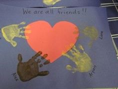 two handprints on paper with the words we are all friends