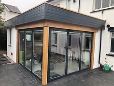 a house with an open patio and sliding glass doors