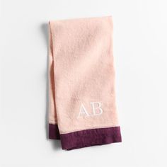 a pink towel with the letter ab on it