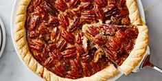 a pecan pie is cut into slices