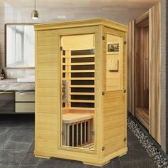 a sauna is shown in the middle of a room with stone flooring and walls