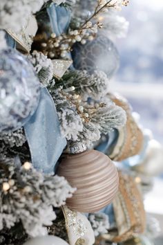 a decorated christmas tree with ornaments on it