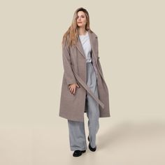 Dana offers an update to the classic wool trench coat with tie closure, a gorgeous length, and an interior cell phone pocket. The stylish cut of this professional piece is sure to keep you warm and fashionable on those chilly spring mornings with a waist button and adjustable sash. DETAILS & CARE Extremely soft, heather wool blend in classy shades Waist button fastener and tie waist belt Two patch pockets at front and interior pocket sewn in lining Approx. 39.5 inches long from center back t Office Wool Coat With Notch Lapel And Belted Cuffs, Spring Business Wool Coat With Lapel Collar, Belted Wool Coat With Lapel Collar For Work, Long Belted Outerwear For Work, Belted Wool Coat With Notch Lapel For Business, Winter Workwear Blazer With Belted Cuffs, Office Long Coat With Belted Cuffs, Business Wool Coat With Notch Lapel And Belted Cuffs, Business Wool Coat With Belted Cuffs And Notch Lapel