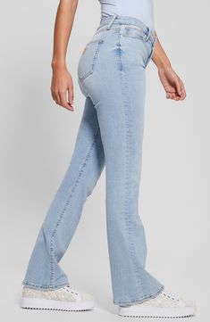 A groovy flare-leg silhouette with a classic mid rise packs a stylish punch in light-wash jeans softened with just a hint of easy-moving stretch. 32" inseam; 10" leg opening; 10 1/2" front rise; 14 1/2" back rise Zip fly with button closure Five-pocket style 78% cotton, 20% polyester, 2% elastane Machine wash, tumble dry Imported Fitted Light Wash Flare Jeans, Trendy Light Wash Mid-rise Flares, Casual Light Wash Flares For Fall, Casual Full-length Blue Flares, Casual Blue Full-length Flares, Spring Light Wash Straight Flare Jeans, Casual Blue Full Length Flares, Casual Full Length Blue Flares, Fitted Blue Straight Flare Jeans