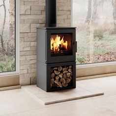 a wood burning stove in front of a window