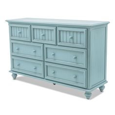 an image of a blue dresser with drawers