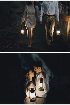 two people walking in the dark with lanterns on their hands and one person holding a light