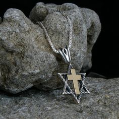 "Since ancient times, humans have known about the protective properties of these most ancient and mysterious symbols from the history of mankind. It is believed that the magic code encrypted in the Star of David brings luck, health and protection to its owner, and the cross endows it with Divine grace and faith in Salvation from evil and negative energies. Typically, these amulets were worn by Christians and Messianic believers, and today their owners are united by a deep respect and connection Symbolic Star Of David Engraved Necklace, Silver Star Of David Necklace Tarnish Resistant, Silver Star Of David Jewelry Tarnish Resistant, Gold Sterling Silver Star Of David Necklace, Engraved Sterling Silver Star Of David Necklace, Sterling Silver Star Of David Amulet Necklace, Spiritual Yellow Gold Cross Necklace, Silver Star Of David Necklace In 14k Gold, 14k Gold Silver Star Of David Necklace