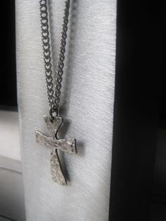 Sterling Silver Cross Pendant Necklace Silver Cross Jewelry Religious Pendant Gift for Him Gift for Her PENDANT Rustic, solid sterling silver cross measures .5 inches x .75 inches. It is hammered and shown lightly oxidized. CHAIN Necklace is a solid stainless steel curb chain that is 3mm wide and has a lobster claw/ring closure. SIZE In personalization at checkout please add your preferred end to end chain length(includes clasp)from 12-24 inches. Shown worn long on model is 24 inches. Gift Sterling Silver Cross Necklace With Oxidized Finish, Hand Forged Silver Cross Pendant Necklace, Silver Symbolic Cross Necklace As Gift, Hand Forged Silver Cross Necklace, Hand Forged Silver Cross Pendant Jewelry, Silver Hand Forged Cross Pendant Jewelry, Hand Forged Cross Jewelry For Gifts, Hammered Cross Pendant Jewelry As A Gift, Hammered Cross Pendant Necklace For Gift