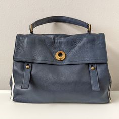 Yves Saint Laurent Muse Bag Used Condition Color: Dark Navy, Cream Dimensions (Approx): L - 15 Inches, H - 11 Inches, W - 7 Inches Made In Italy Blue Saint Laurent Bag, Saint Laurent Bags, Yves Saint Laurent Bags, Dark Navy, 11 Inches, Muse, Yves Saint Laurent, Saint Laurent, In Italy