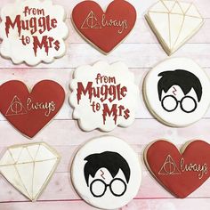 harry potter cookies are arranged on a wooden surface with the words from muggle to mrs