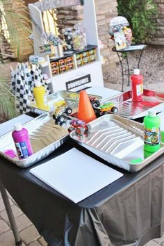 two trays on top of a table covered in plastic