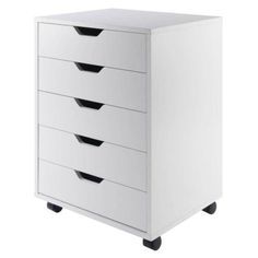 a white dresser with four drawers on wheels