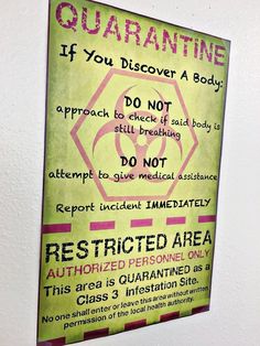 a sign on the wall that says quarantine if you discovery a body