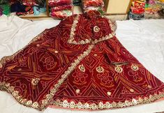 "Thank you very much for visiting my shop. Traditional Chunri bandhej full stich lehanga with beautiful heavy gotta patti work With beautiful dupatta gotta work 2.5 meter and running blouse Full stitched with aster ( Lining ) waist and length Both 41 to 42 Note : WE ARE GIVEN FREE BLOUSE STITCHING OFFER We are having expert staff in stitching .We are also take orders for dance performance, stage performance, marriage party, theme dresses, and any other demand etc.    Easy to wear and very comfortable  THERE IS LITTLE BIT DIFFERENCE IN THE PURPLE AND IN PINK It Gracefully Add Style To Your Attire & Match With Your Confidence Disclaimer: Colors may slightly vary due to Photographic effects IMPORTANT NOTE : Please Be aware that Similar Looking Products of LOW QUALITY are Being Sold at Lower P Choli With Dabka Work For Navratri Ceremonies, Dabka Work Choli For Navratri Ceremonies, Dabka Work Lehenga For Navratri, Navratri Lehenga With Dabka Work For Traditional Ceremonies, Dabka Work Dupatta For Traditional Ceremonies And Festivals, Festival Dabka Work Dupatta For Traditional Ceremonies, Festival Anarkali Set With Gota Work For Traditional Ceremonies, Bandhani Print Chinon Lehenga For Festivals, Chinon Lehenga With Gota Work For Traditional Ceremonies