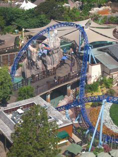 an aerial view of a roller coaster ride at a theme park in the united states