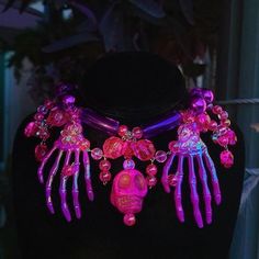 For my fellow pink loving goths  About: 💘 Necklace is 19.5" long with an adjustable extension, so you can wear it as a choker or longer. 🖤 Beads are all made of acrylic. Some skull charms are made of glass. 💘 Beads are strung on a stainless steel beading wire & is enclosed with a lobster claw clasp. If you have any questions please send me a message! Adjustable Necklaces For Halloween Costume Party, Handmade Pink Jewelry For Halloween, Adjustable Halloween Choker, Halloween Costume Choker Necklace, Pink Punk Choker As A Gift, Pink Punk Choker For Gift, Pink Punk Choker As Gift, Rave Jewelry For Halloween Party, Emo Choker For Halloween Party