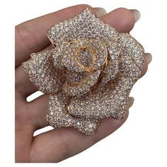 Large Diamond Rose Brooch/Pin/Pendant 22.00 Carat Total Weight in 18k Rose Gold Large Flower Brooch in 18k Rose Gold features 22.15 carats of Round Brilliant Diamonds pave-set in 18k Rose Gold. The diamonds are bright and lively. This versatile piece serves as a Pin, Brooch, and Pendant all in one. It has a double bar attachment with safety and a hidden bale on the back side. Brooch measures 2.50 inches across and 2.25 inches down. Brooch weighs 52 grams. Marked 750, D22.15. BUY WITH CONFIDENCE Gold Diamond Jewelry With Rose Design, Luxury Flower Shaped Brooch Jewelry, Luxury Pink Brooches For Wedding, Luxury Pink Brooch For Wedding, Elegant Rose Gold Brooches For Anniversary, Luxury Rose Design Jewelry For Anniversary, Luxury Rose Gold Flower Jewelry, Luxury Rose-colored Jewelry For Anniversary, Luxury Pink Wedding Brooches