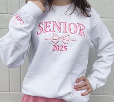 This cute and comfy sweatshirt is a great gift choice for any high school or college senior or grad. Available in various sizes, two styles (crewneck and hoodie) and multiple colors. Option to customize the sleeve with a name, school, initials, etc.  Perfect gift for birthday, holidays and graduation. Grad Gift, New Grad Gift, Graduation Sweatshirt, College Graduation, Graduation Gift, High School Graduation, Christmas gift for Grad, Senior Night "SENIOR" will be embroidered in the preppy arched High School Senior Christmas Gift Ideas, Senior Sweatshirts Ideas 2025, Senior Sweatshirts Ideas Diy Patches, White Letter Embroidery Sweatshirt For School, White Embroidered Sweatshirt For School, White Custom Embroidery Sweatshirt For School Spirit, White Tops With Letter Embroidery For School, White Letter Embroidery Top For School, White Embroidered Letter Top For School