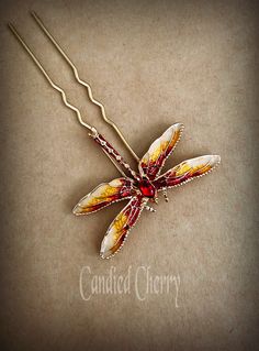 Art Nouveau style red / yellow / gold dragonfly hair pin : "RENÉ" an original design by ©Candied Cherry by KC. 3 more color available (last photo) : dark blue / green, black / white, purple / milk. Please note that product colors in photos may appear slightly different on various computer monitors/smart phones/tablets. Contact my shop if any additional photos are needed. Measures approx : dragonfly part 1 7/8" (4.8cm) x 1 1/4" (3.2cm), total 3" (7.7cm) long including hairpin part.  Please read my store policies before committing to purchases : https://www.etsy.com/jp/shop/WhitePeonybyKC/policy IMPORTANT NOTE TO INTERNATIONAL CUSTOMERS Be aware that my shop is not responsible for international customs fees, tariffs, (VAT) value added taxes, or other country-specific costs that may be incurr Handmade Gold Hair Accessories For Gifts, Handmade Red Hair Accessories For Gifts, Dragonfly Hair Clip, Red Dragonfly, Rehearsal Dinner Outfits, Pink Dragonfly, Galaxy Hair, Lace Mask, Cherry Candy