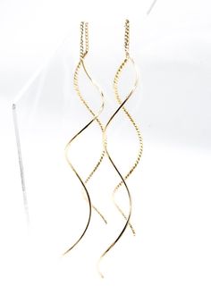 Artisanal & Unique!  These gorgeous minimalist thin gold swirl coil curved cable threader dangle earrings are designed and hand crafted to perfection with thin gold plated metal curved wires and chain.  Lightweight and comfortable, these gorgeous earrings are hand-made by creative artisans and the style is modern, minimalist, timeless & unique! ☆ Specifications: * Each Curved Threader Wires 2 1/4" Long - Measures  5" Long Total Length * Triple Gold Plated Metal Wires * Lead, cadmium & nickel-fre Cable Wire, Gorgeous Earrings, Favorite Jewelry, Swirl, Dangle Earrings, Etsy Accessories, Jewelry Earrings, Accessory Gift, Electronic Accessories