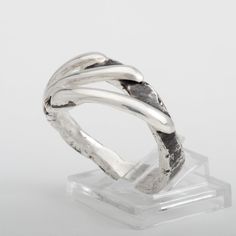 This "Tofino" silver ring is handmade in 925 Sterling Silver in my workshop. The ring is hand crafted with 92.5% pure silver, using a free form casting technique. Materials: 92.5% pure solid silver Ring size: 11 (This is a unique creation. It cannot be reproduced or resized. Only one size available.) Hand Cast Silver White Bronze Rings, Artisan Hand Cast Open Ring, Hand Forged Sterling Silver Rings With Open Band, Minimalist Sterling Silver Rings With Lost Wax Casting, Unique Hand Forged Sterling Silver Rings, Hand Cast Sterling Silver Stackable Rings, Artisan Hand Cast Silver Rings, Cross Jewelry Necklace, Bronze Jewelry