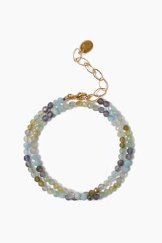 Soothing shades of blue and green decorate this bracelet featuring aquamarine, iolite, green aventurine, green garnet, and grey labradorite finished on an 18k gold plated chain. An ideal silhouette for layering. 18k gold plated sterling silver. 12 - 14" adjustable. Handmade in Vietnam. Double Wrap Bracelet, Green Garnet, Multi Strand Bracelet, Handmade Box, Chan Luu, Strand Bracelet, Gold Plated Chains, Green Aventurine, Multi Strand