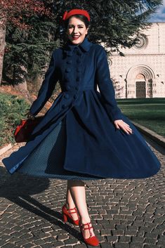 The fit and flare coat is the ultimate in luxury women's outerwear and a real statement piece. The pleating at the front adds structure whilst the cinched in waist and full skirt gives a feminine look. The navy coat can be paired with your existing winter wardrobe easily and you'll find that this winter wool coat match Wacky Clothes, Winter Wool Dress, Blue Wool Coat, Fit And Flare Coat, Winter Coat Women, Gown Ideas, Princess Coat, Wool Winter Coat, Navy Coat