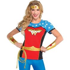 a woman in a wonder costume posing for the camera with her hands on her hips